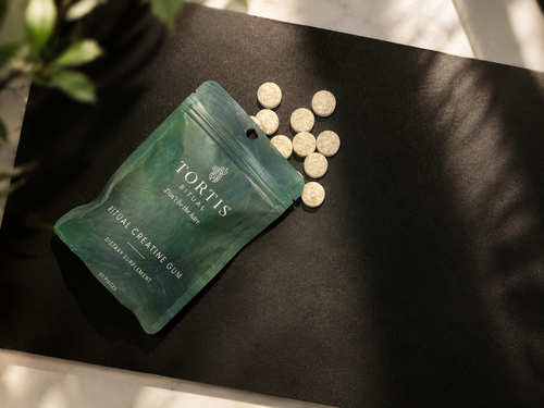 One TORTIS Ritual creatine gum pouch with gum pieces spilling out